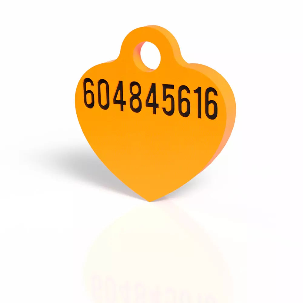 Chapita con forma de corazón naranja