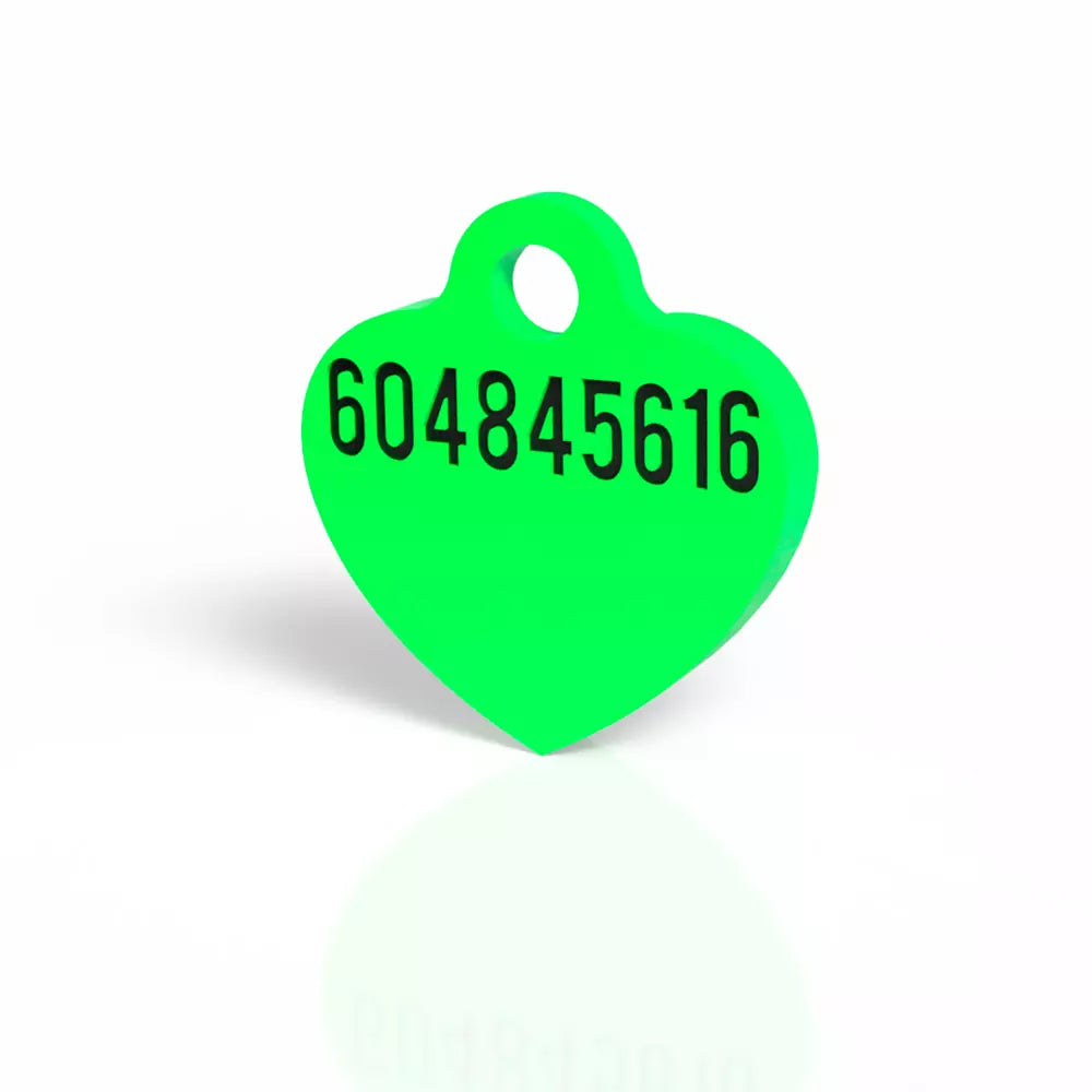 Chapita con forma de corazón verde