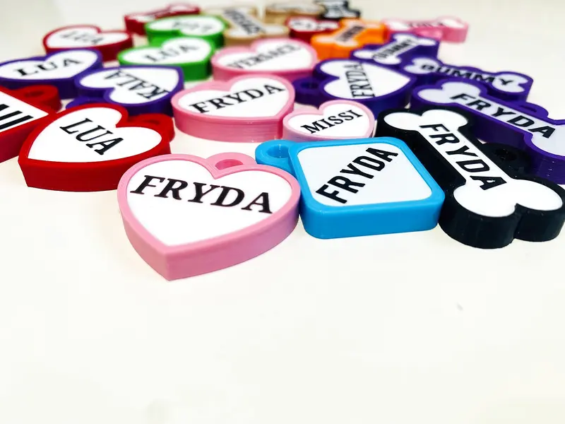Chapitas de perro en forma de corazón y hueso: Fryda, Missi y Lua